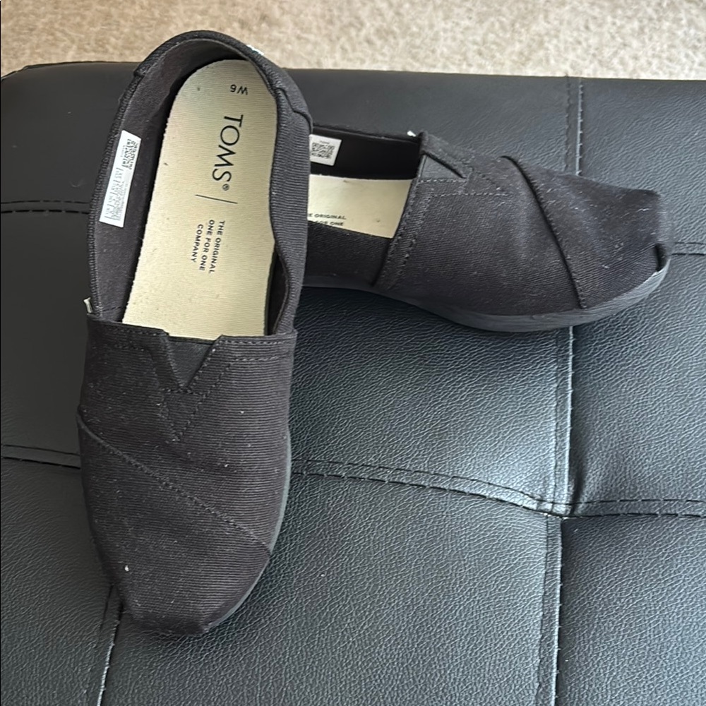 TOMS Classic Black Canvas Slip-Ons